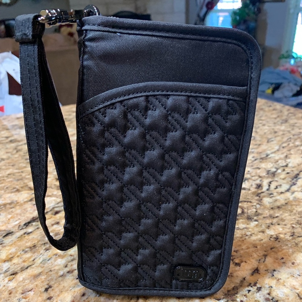 Black lug tandem, perfect travel companion this case has multiple compartments